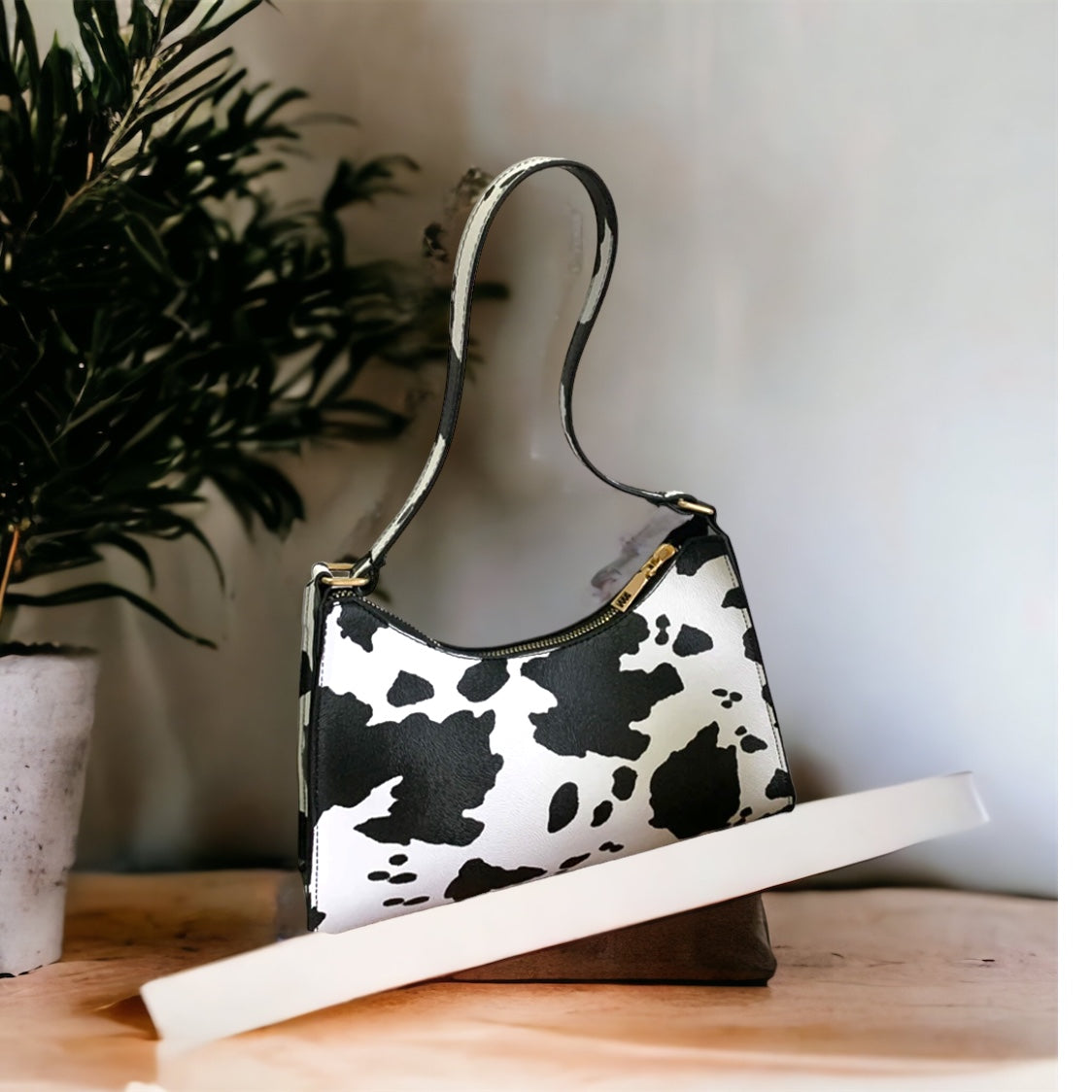 Cow print best sale shoulder bag